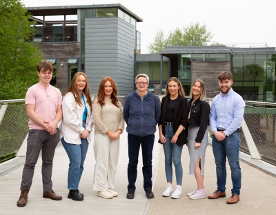 The UL students with RTÉ RnaG broadcaster Áine Hensey pictured on the Living Bridge
