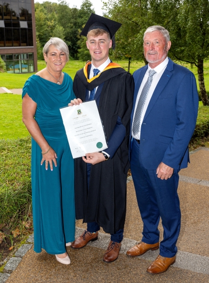 Tiarnan pictured at his grads with his parents