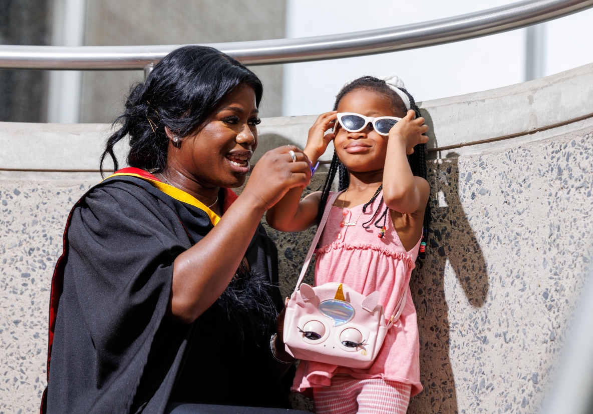 An image of a mother and her daughter at conferring in UL