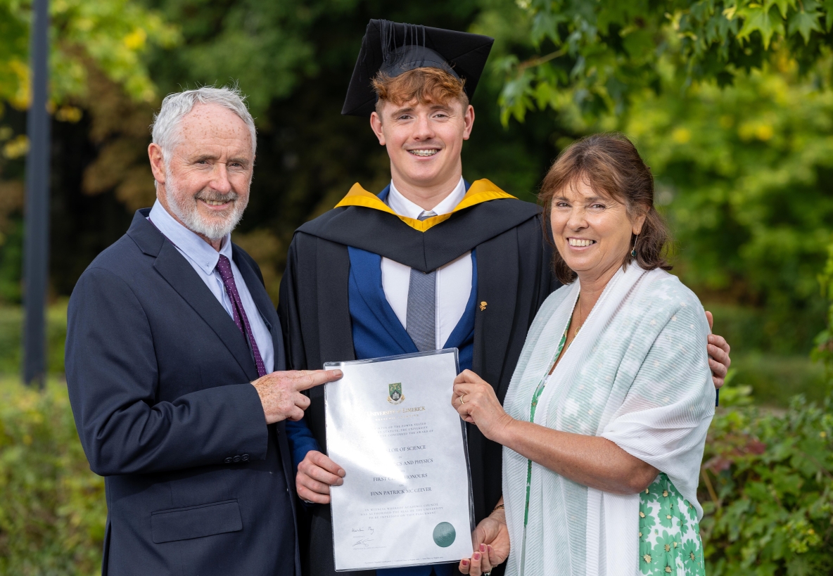 Finn McGeever with his parents at his graduation