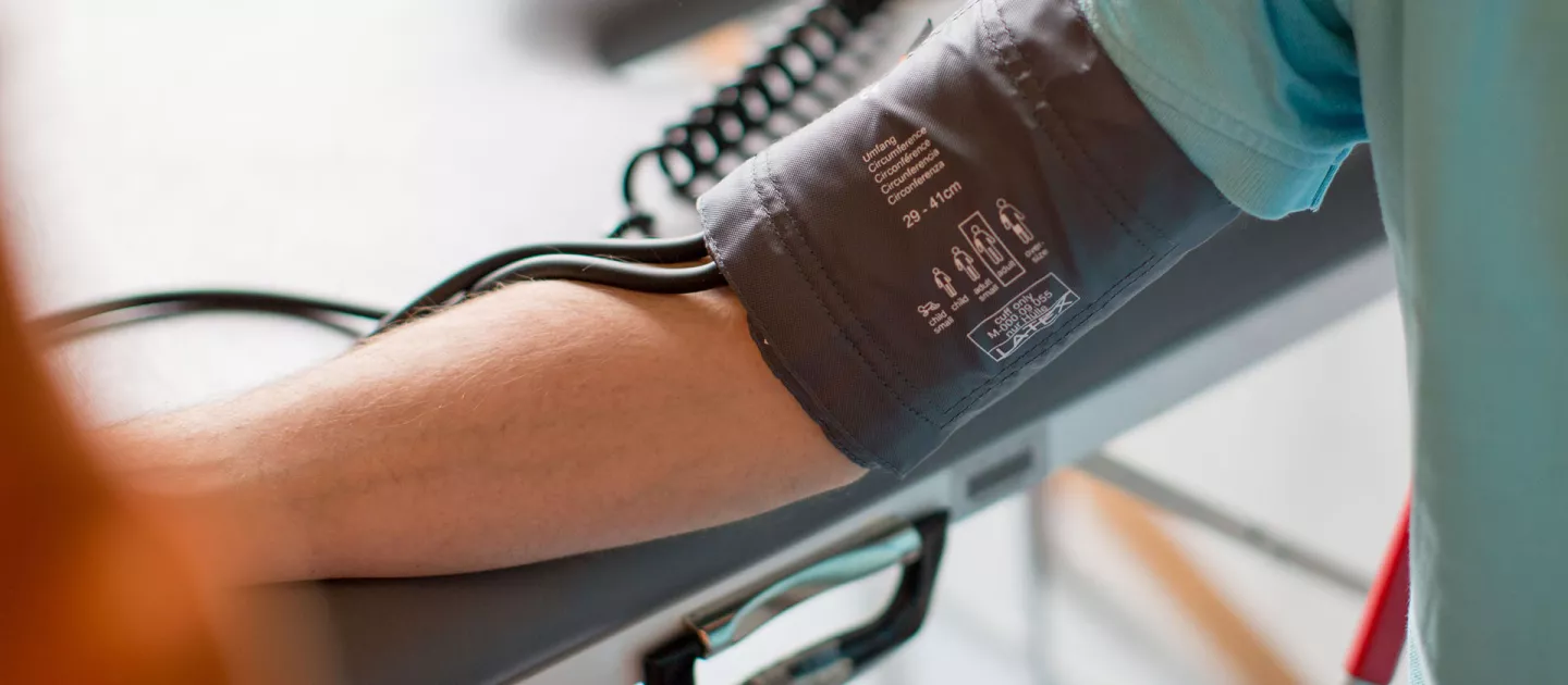 picture of person having their blood pressure taken