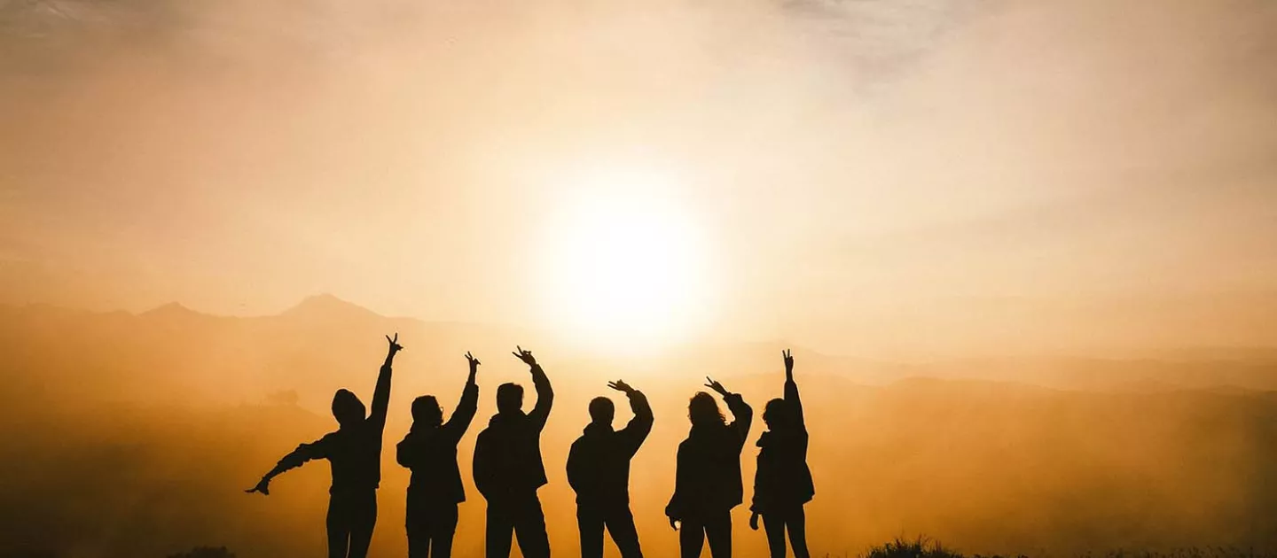 Banner with people and sunset