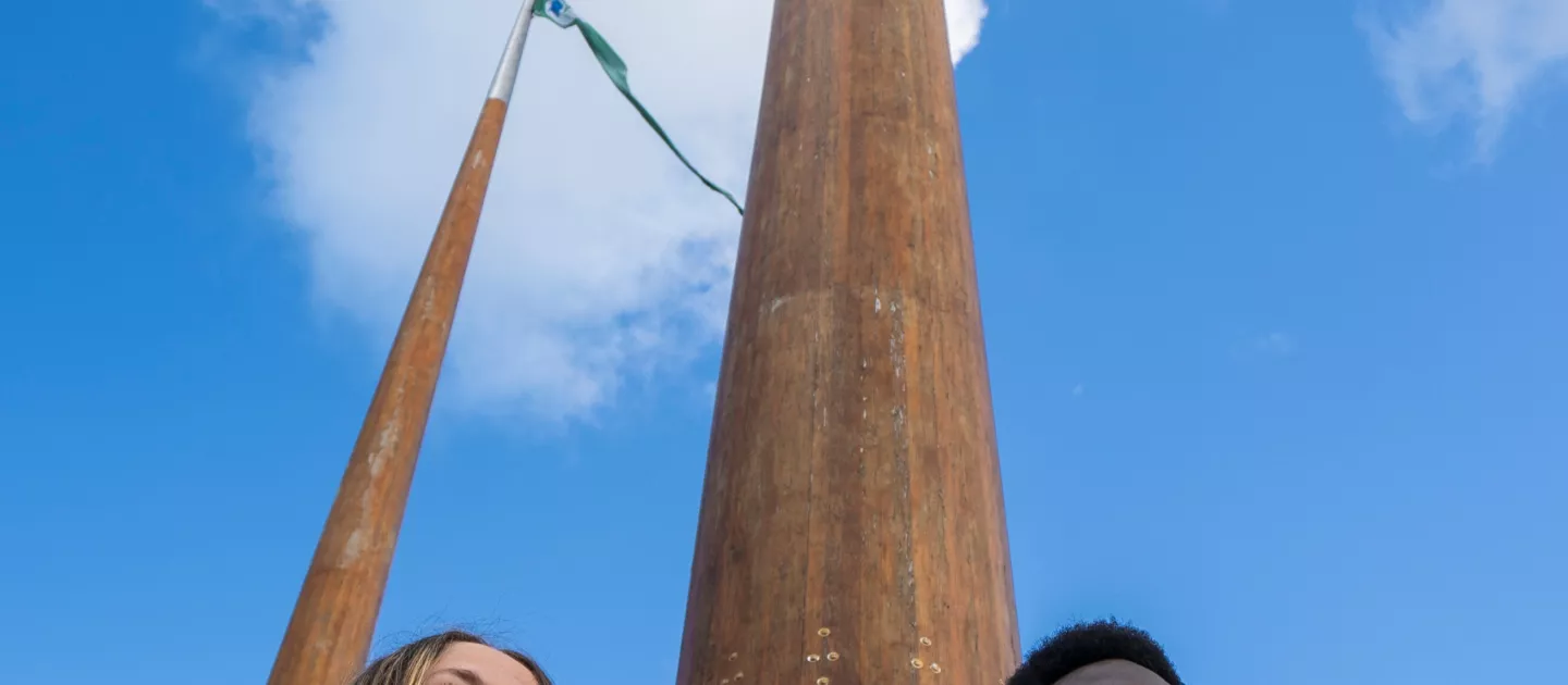 Students at UL flagpoles