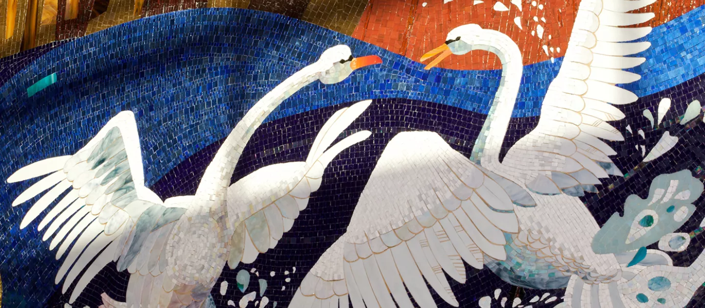 mosaic image of two swans