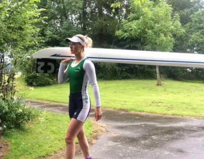  Name girl carrying boat