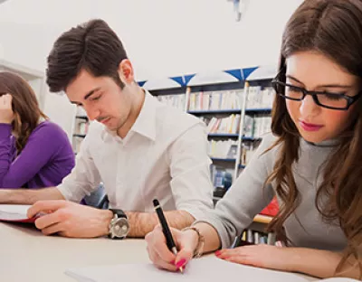 3 students studying