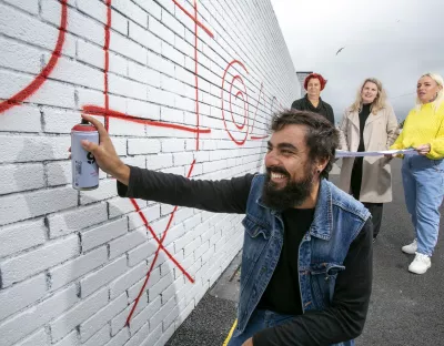 Artist Digo Diego poses at the UL City Centre campus