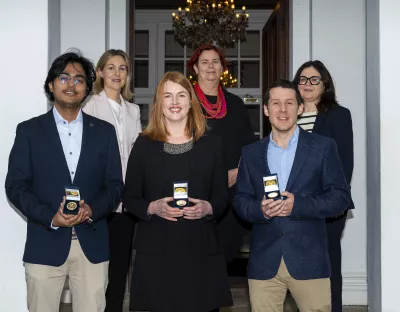 The group of early career researchers pictured with Prof Mey and Prof Kennedy