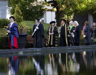 Staff and invited guests marching in procession through the University of Limerick campus 