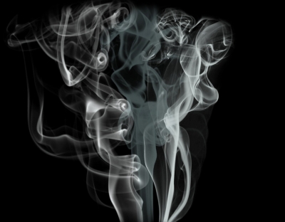 Image shows smoke on a black background.