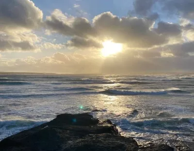 Image shows sunshine on an ocean