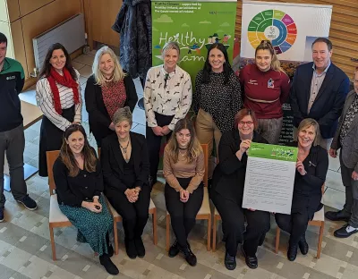 A picture of the Healthy UL team at the charter signing