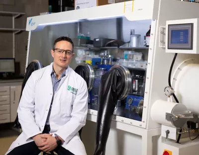 A picture of Professor Kevin M Ryan in the lab at UL