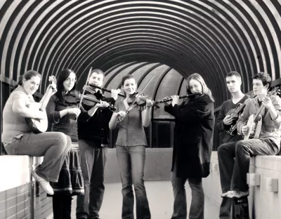 group of students pose with their instruments 