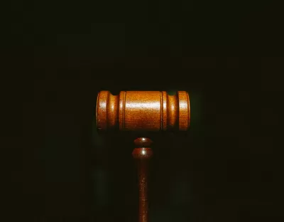 Gavel against black background