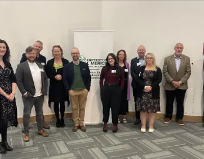 Group of attendees and speakers pictured at the event 