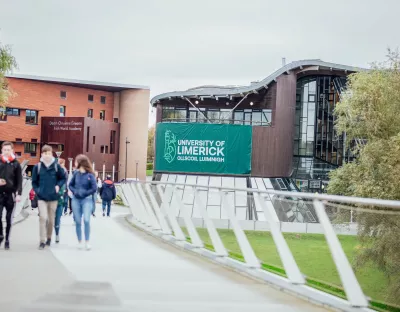 A file image of people walking on the Living Bridge at UL