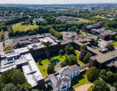 An aerial image of the UL campus and Main Building