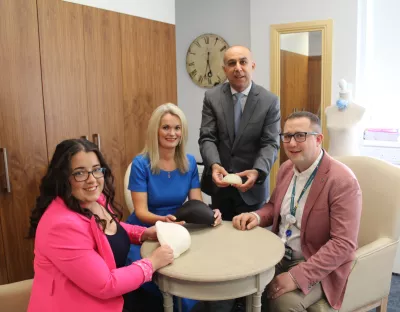 The group pictured in the fitting room in the Symptomatic Breast Unit University Hospital Limerick