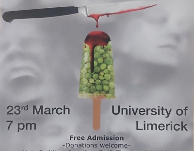 Poster advertising Woyzeck German play includes a bloody dagger and ice pop made of frozen grapes 