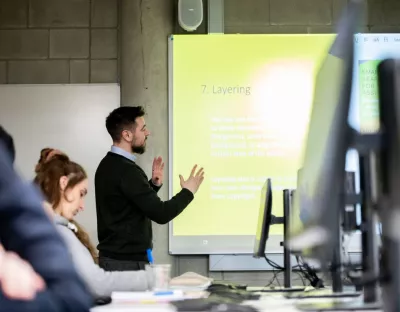 Image of a staff member presenting to students