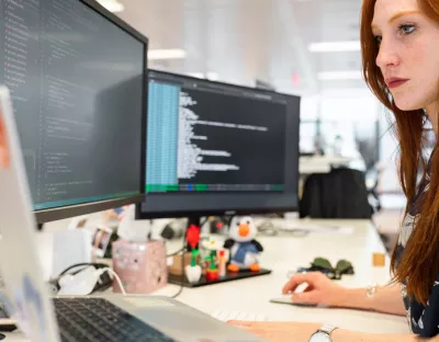 person sitting at computer