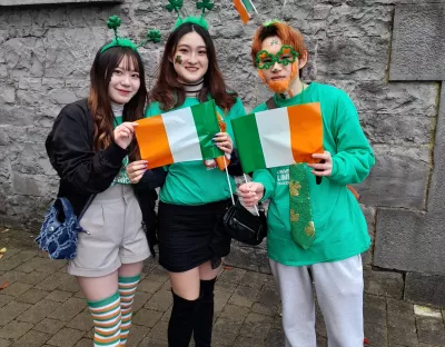 3 ULLC Students with Irish flags