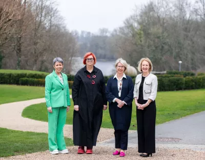 A picture of four female university presidents on the UL campus with the river Shannon as a backdrop