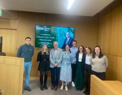 A group of students with Colonel Colm Doyle