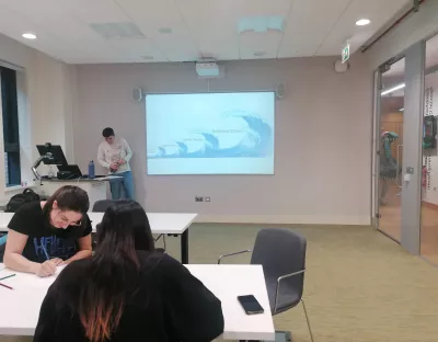 A photo of a room of students doing an exercise to map their eco-anxieties