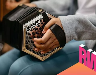 student playing the concertina, with the Research week logo in the corner