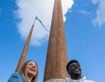 Students at UL flagpoles