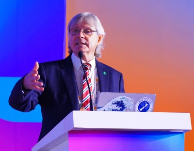 Nige Healey speaking at a conference