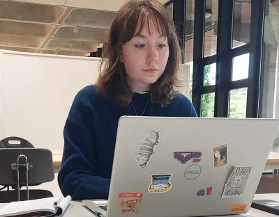 Louise Blair working on laptop