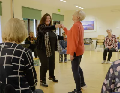 Older adults attending the seminar which features movement and music.