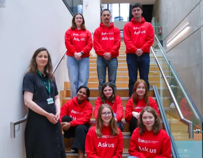 group of library peer advisors on the library staircase