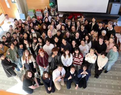 Big group of 4 year japanese students in the globe