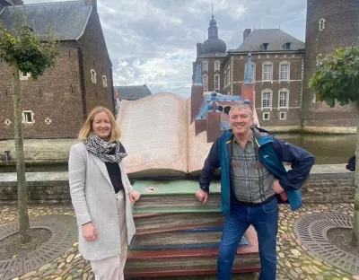 Helen Fitzgerald and Dr Johnny Connolly in a town square in Herleen, the Netherlands