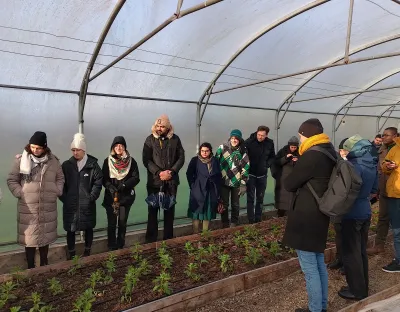 Doctoral programme participants viewing a poly tunnel at Irish Seed Savers in Tipperary