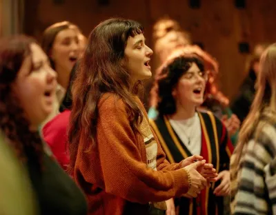 Group of singers in bright colourful clothing