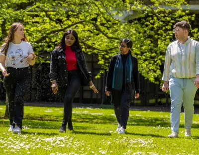 Students walking on a green