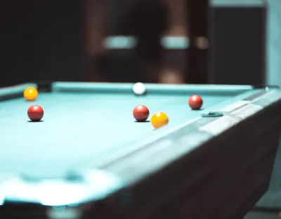 Image shows a pool table 