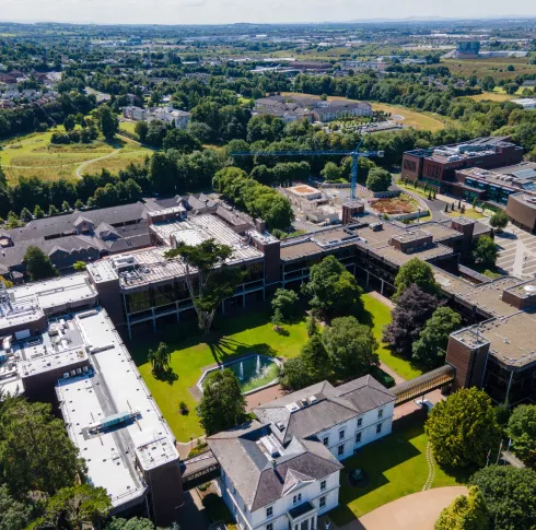 An aerial image of the UL campus and Main Building