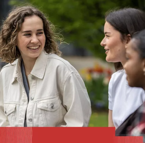 3 undergraduate students laughing