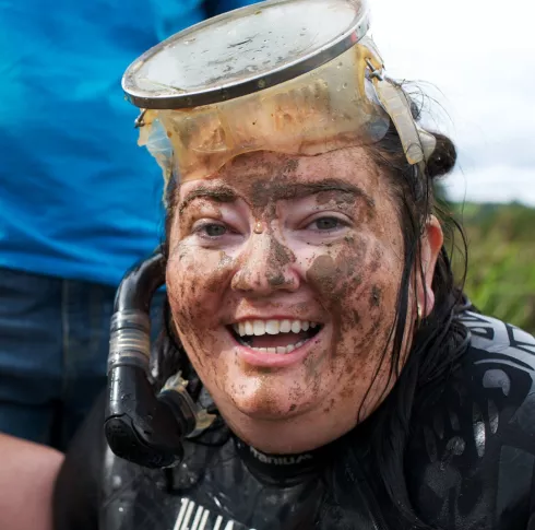 Julia Galvin laughing in a bog