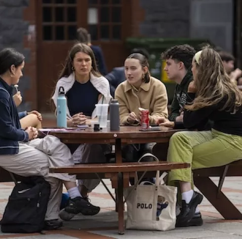 Student in courtyard at UL