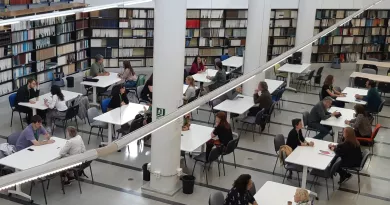 Image shows people at a table during speed dating event as part of YERUN Workshop 