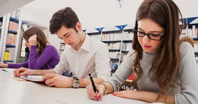 3 students studying