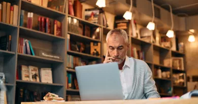 Mature student working on a laptop