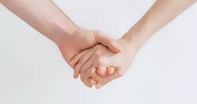 two people holding hands